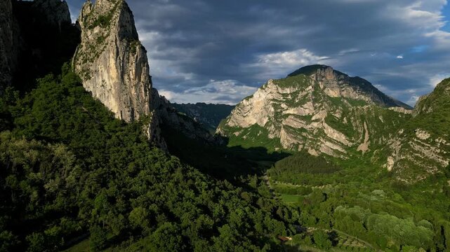 Panoramic mountain view near the village of Saou in the Drome department in France of the Vercors hills, the marly hills and the Val de Drome valley. The Saou forest and the 3 peaks - Drome Valley