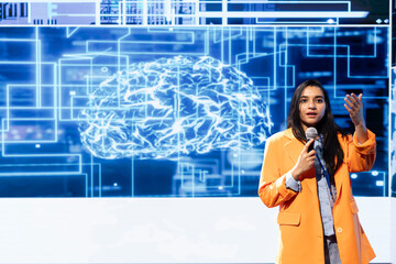Engaging speaker talking at AI conference, sharing industry expertise to inspire and motivate...