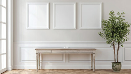 Four white picture frames on the wall above an antique long console...