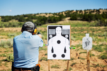 Man at gun outdoor range 