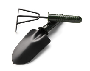 Shovel and rake on white background. Gardening tools