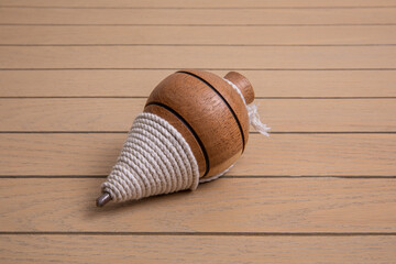 trompo, mexican toy handmade from mesquite wood