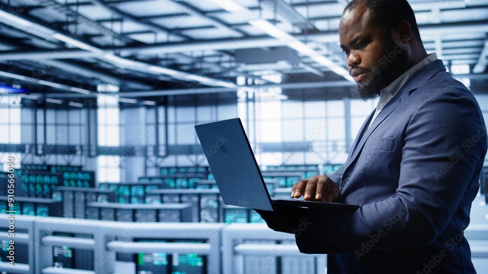 Poster software developer in server hub checking recovery plan on laptop, monitoring hardware energy consum