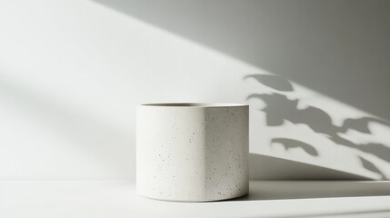 A ceramic vase with plain background