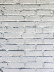 old brick wall with white painted finish