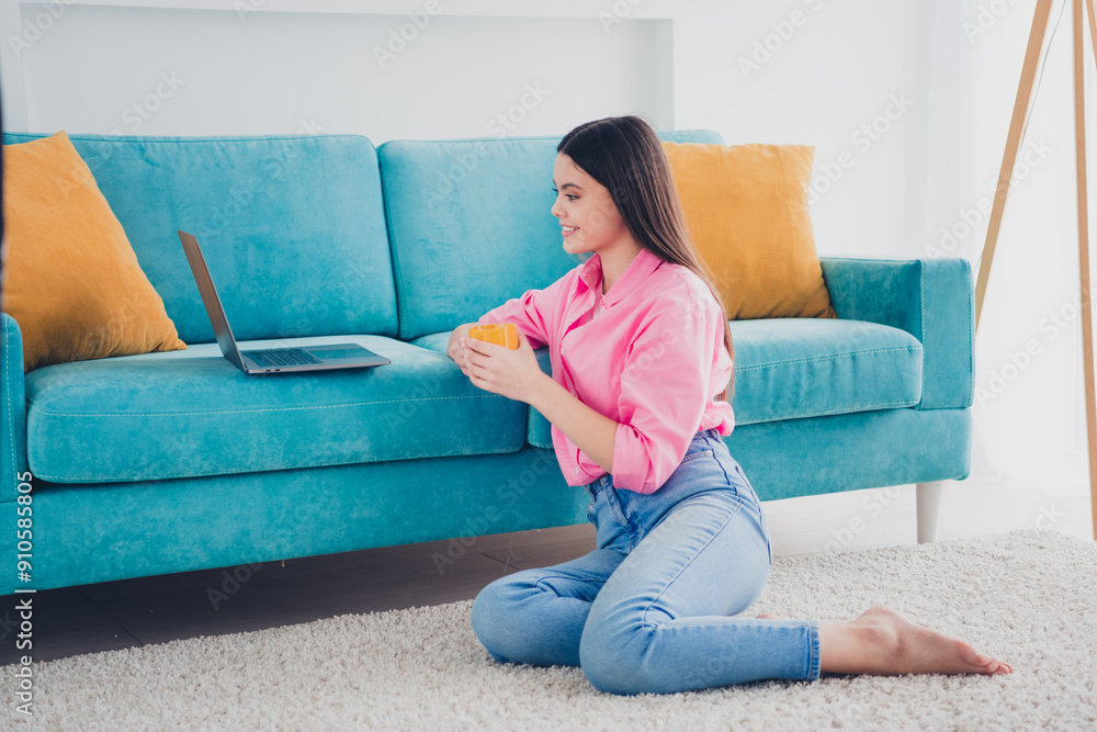 Sticker Photo of pretty cheerful lady wear pink shirt drinking tea watching film modern device indoors room home house