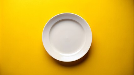 Empty plate on yellow background with copious space, perfect for adding text or graphics, conveying themes of hunger, emptiness, or waiting for a culinary delight.
