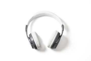 Fototapeta premium White Headphones on White Background