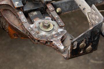 Gathering chain on combine harvester corn head. Farm equipment maintenance, repair, and service...