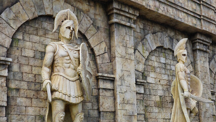 Warrior rome greek. Warrior wearing iron helmet and warrior old metal shield. Ancient warrior isolated