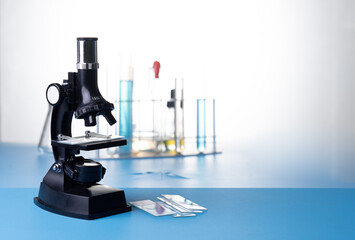 Microscope biology and chemistry subject on the desk