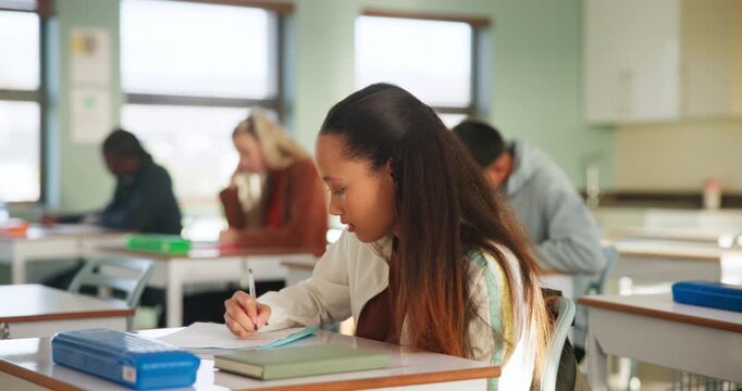 Student, girl and writing in exam with learning, thinking and ideas in classroom, high school or education. Female person, teenager and remember in scholarship, development with confident in academy