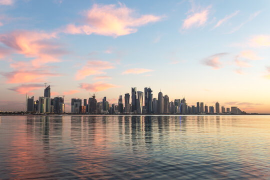 Qatar, Doha. Cityscape at sunrise from the Corniche