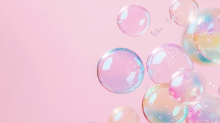 Bubbles of various sizes float freely on a gentle pink backdrop, creating a whimsical, joyful atmosphere.