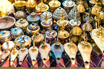 Old lamps and souvenir for sale in the old souk of Mutrah, Muscat, Oman