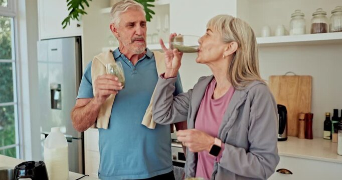 Senior couple, smoothie and happy in kitchen with toast for workout, wellness and supplements in home. People, woman and man with protein, green juice and cheers for achievement with fitness in house