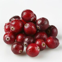 Fototapeta premium A collection of red berries, possibly cranberries or cherries, with a white background.