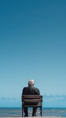 Fototapeta premium old man sitting alone , retirement conceptual image, minimalist, beautiful, centered,