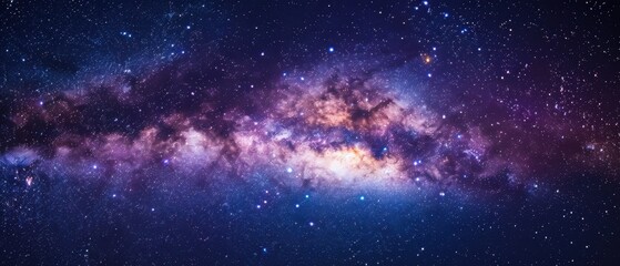 Obraz premium Vivid Milky Way galaxy with colorful nebula and countless stars captured in the night sky. Perfect for space and astronomy enthusiasts.