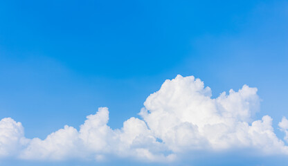 Blue sky on a sunny day. white cumulus clouds