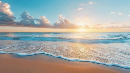 A Wave Breaks on a Sandy Beach at Sunset