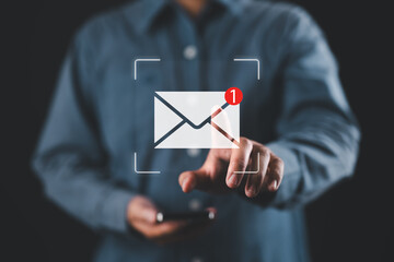 New email notification interaction concept. A person interacting with a floating digital interface showing a new email notification symbol, a concept for online communication. E-mail marketing,