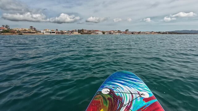 POV shot of Spiaggia di Marathonisi from kayak on sea during daytime Laganas, Greece.