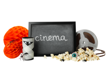 PNG, Reel, popcorn, Halloween decorations and board with text, isolated on white background