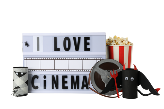 PNG, Reel, lightbox with text, popcorn and paper Halloween figurines, isolated on white background - Powered by Adobe