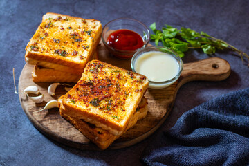 Delicious Homemade Garlic Bread Recipe, Perfectly Buttery serve with sauces.