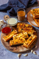 Delicious Homemade Garlic Bread Recipe, Perfectly Buttery serve with sauces.