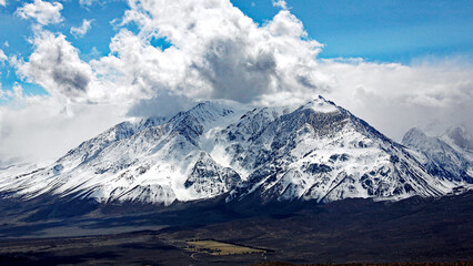 snow covered mountains along the I395 in california