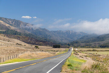 Asphalt road and countryside landscape