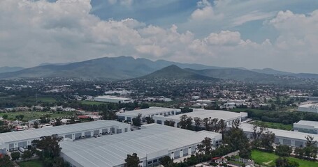Hyperlapse of the Tepotzotlan mountain range that surrounds the metropolitan area of ​​Mexico City during a mid-day with some clouds on the horizon