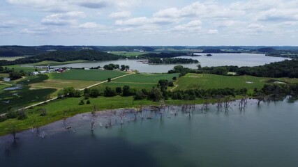 Dead Trees Submerged In A Permanently Flooded Lake In The Rural Farmlands Of Dane County, Wisconsin. Aerial Reverse Shot Over Fish Lake, Lussier County Park.