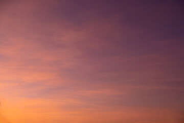 Enjoy a panoramic view of the skyline. The sun rises in the morning sky with colorful clouds. and beautiful cloud patterns In the soft light of the morning	