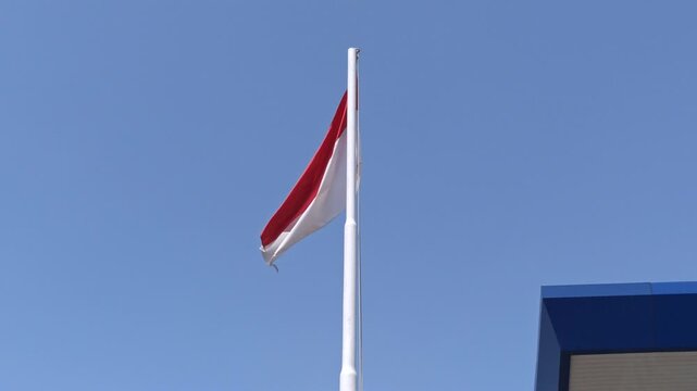 The raising of the red and white flag in almost all institutions in Indonesia and in village settlements as a celebration to commemorate Indonesian Independence Day