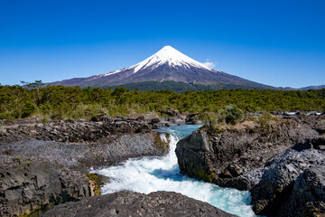 The snow-capped Osorno volcano with the amazing Petrohue Falls in the foreground, Vicente Rosales...