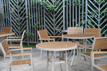 Outdoor area with tables and chairs.
