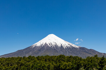 Fototapeta premium Todos los Santos (Allsaints) lake with the snow-capped Osorno volcano in the background, Vicente Rosales National Park, Puerto Varas, Chile. 