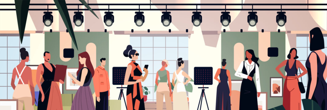 Fashion show runway models audience spotlight modern art exhibition. People in stylish outfits interacting under spotlights in a contemporary gallery setting