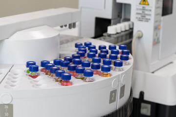 gas chromatography instrument in chemistry, gc, hplc, chemical, glassware., close up, vial on...