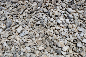 Texture of stone pebbles. Stone rubble background for interior exterior decoration and building industrial design concept.