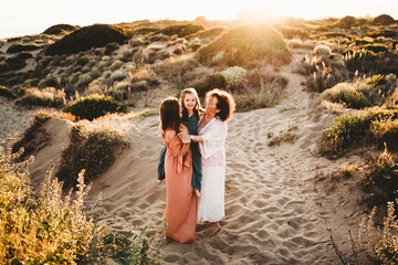 Beautiful white girl smiling at beach on Summer day in Spain