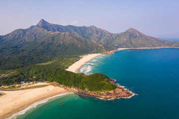 Fototapeta premium Hong Kong: Dramatic landscape of the Sai Kung peninsula with sandy beaches and the Sharp peak in Hong Kong New Territories.