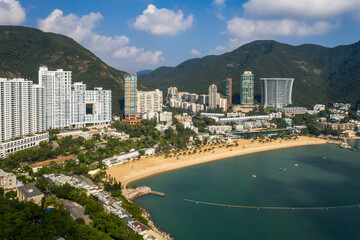 Hong Kong: Dramatic landscape of Repulse bay with its sandy beach and luxury condominium in Hong Kong island