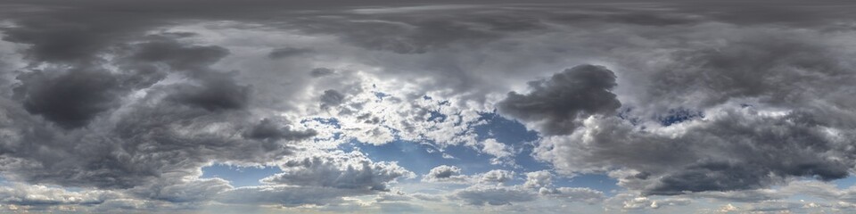 blue sky hdri 360 panorama with dark clouds before storm in seamless equirectangular projection...