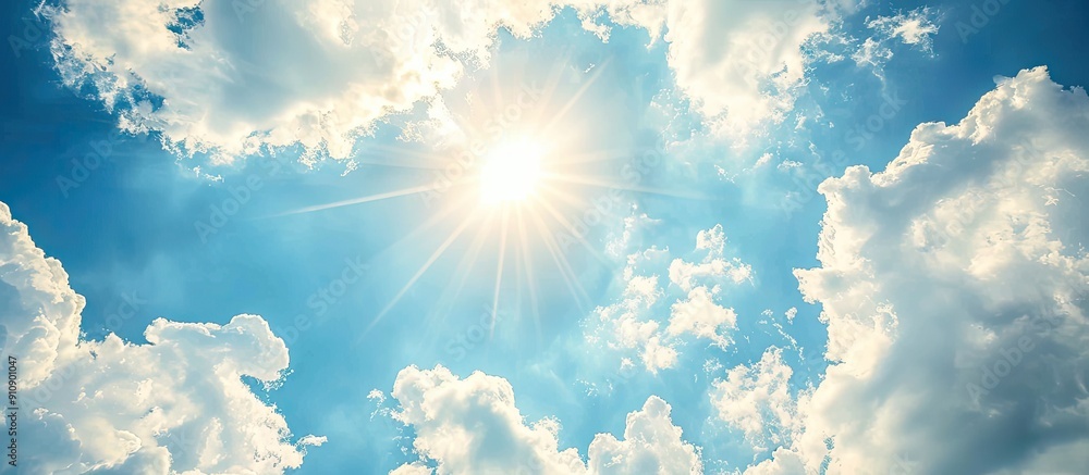 Aufkleber Sunny day with blue skies and white clouds offer an abstract background for a copy space image