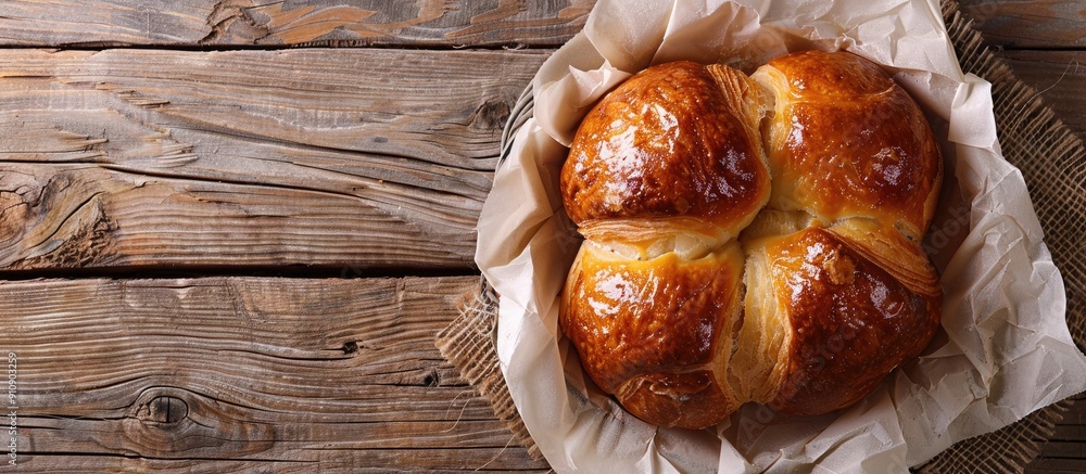 Aufkleber freshly baked sweet brioche pastry on a rustic table with a top view perfect for a delightful meal o