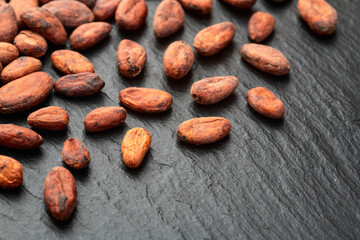 Cocoa beans grain texture . Ingredient for preparating chocolate
